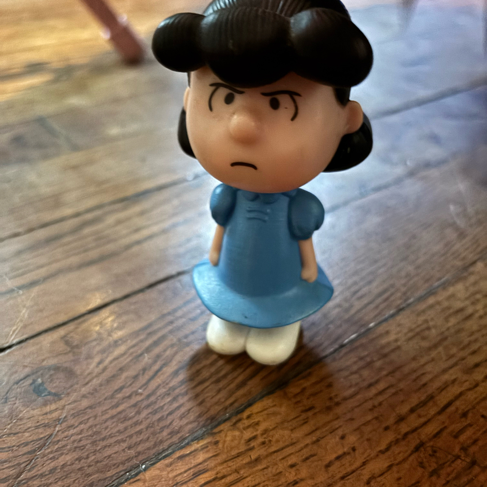 Lucy talking figurine